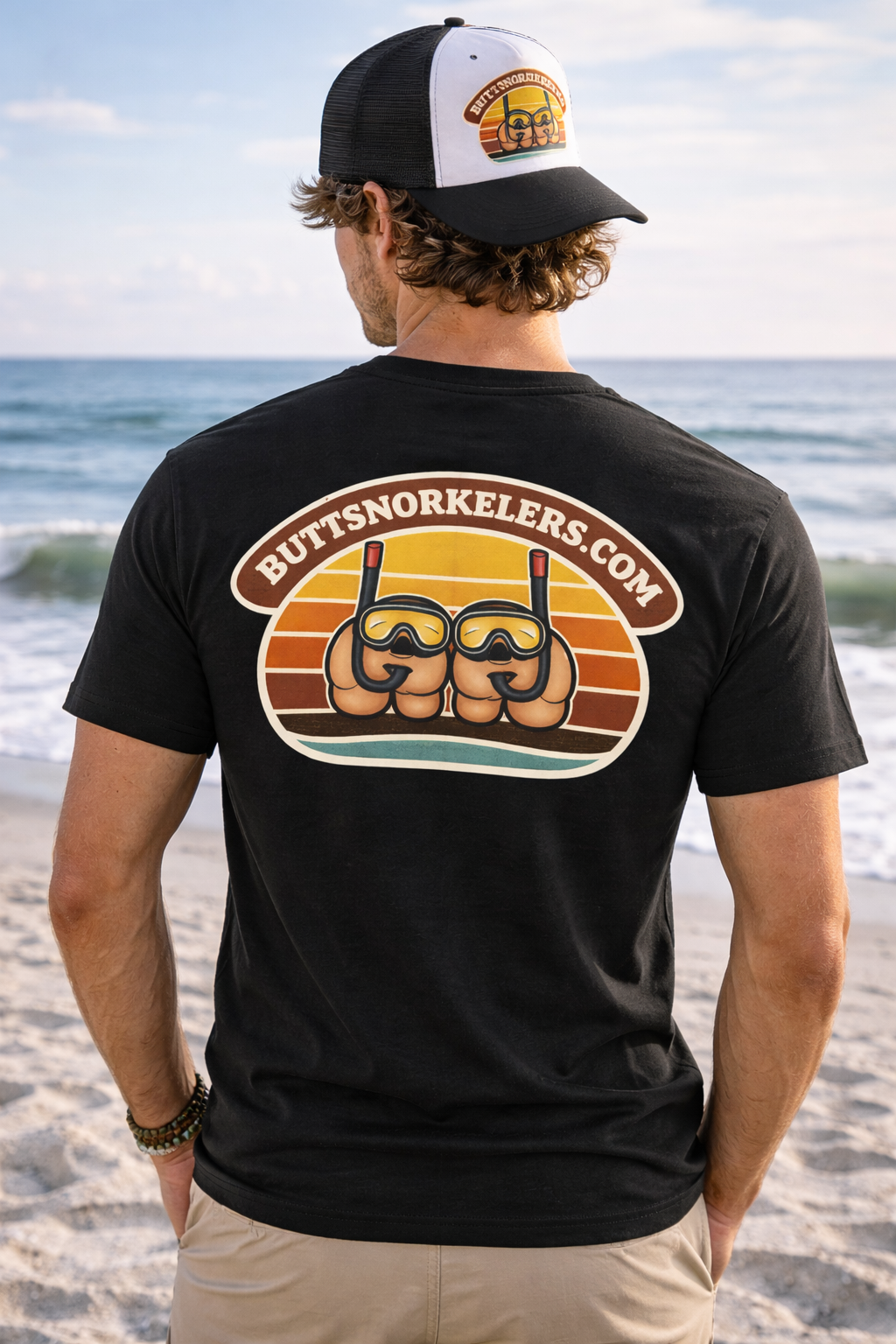 ButtSnorkelers.com full back graphic tee — man at beach showing logo print on back of black shirt