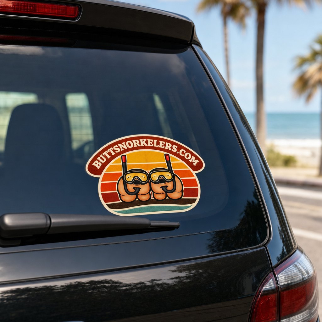 ButtSnorkelers sticker on the rear window of a black SUV at the beach